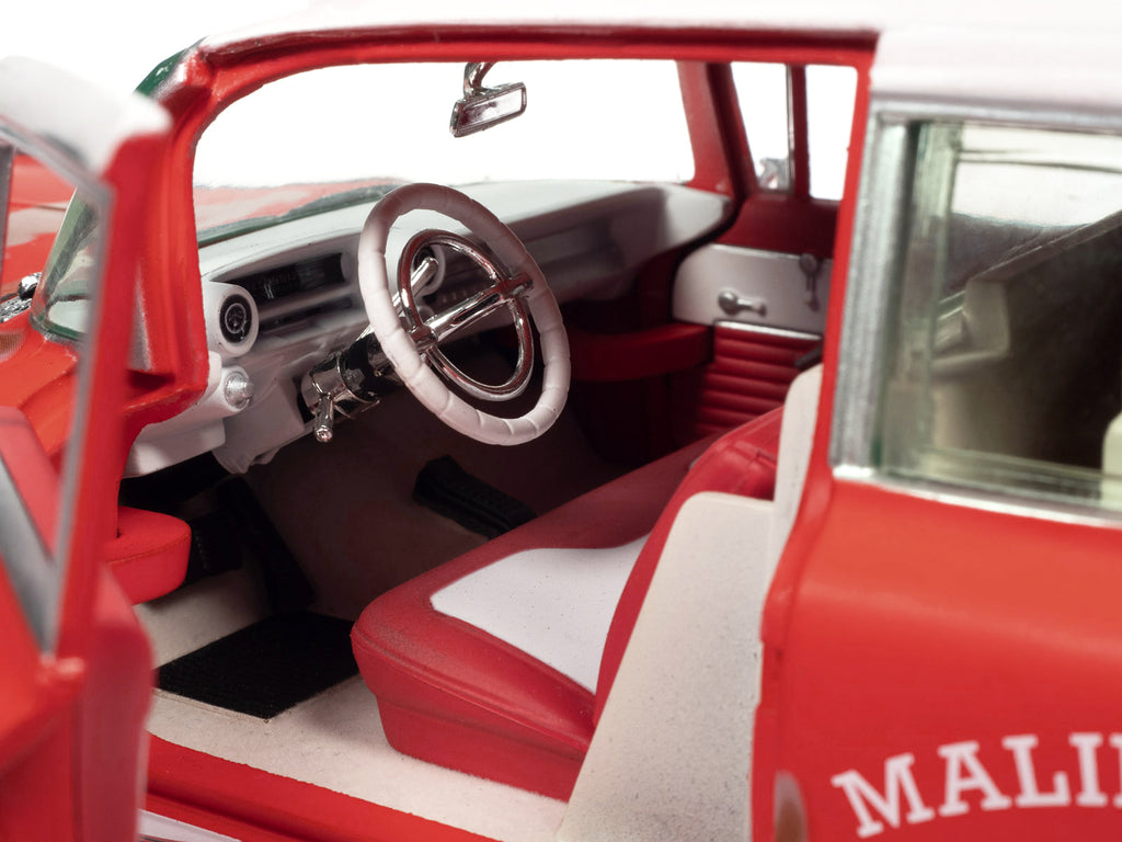 1959 Cadillac Eldorado Ambulance Red with White Top "Malibu Beach Rescue" (Weathered) with Surfboards on Roof "Surf Shark" 1/18 Diecast Model Car by Auto World - image 4