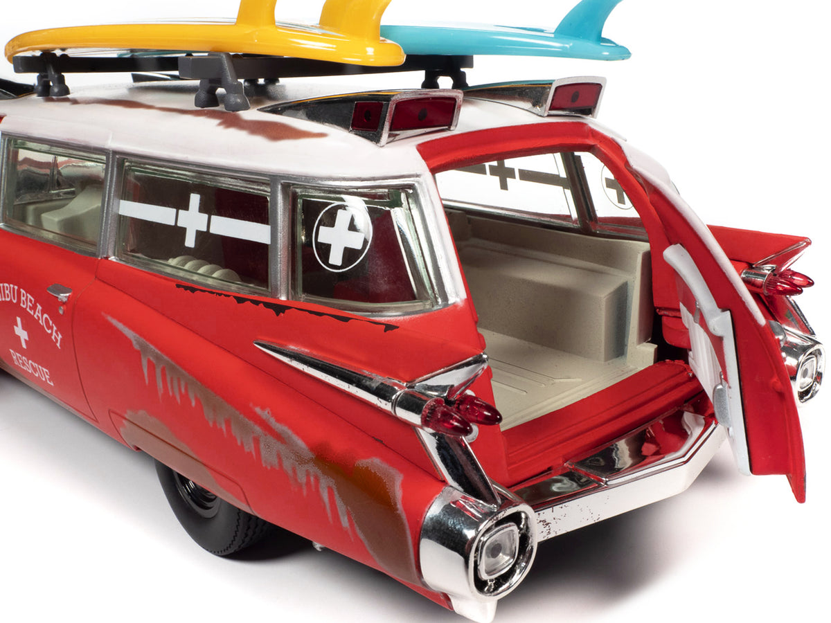 1959 Cadillac Eldorado Ambulance Red with White Top "Malibu Beach Rescue" (Weathered) with Surfboards on Roof "Surf Shark" 1/18 Diecast Model Car by Auto World - image 5