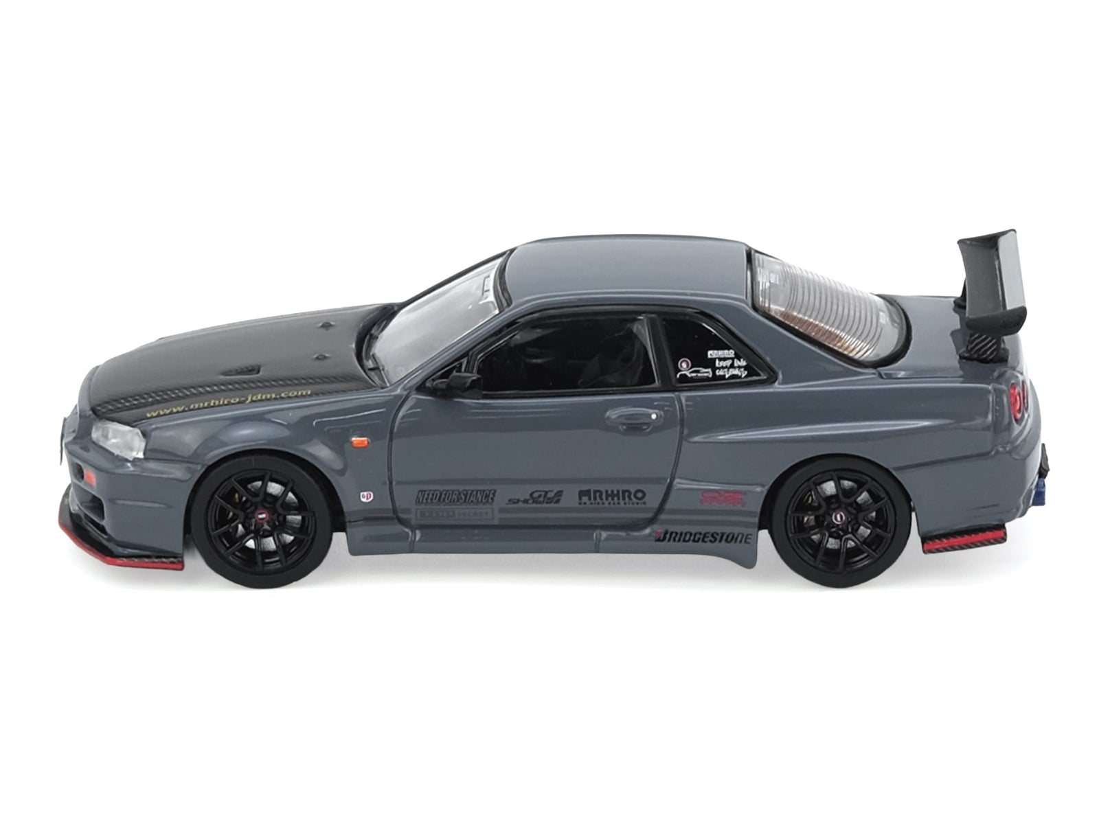 Nissan Skyline GT-R (R34) "Top Secret" RHD (Right Hand Drive) Stealth Gray with Carbon Hood "GTSHOW 2025 Event Edition" 1/64 Diecast Model Car by Inno Models - image 2