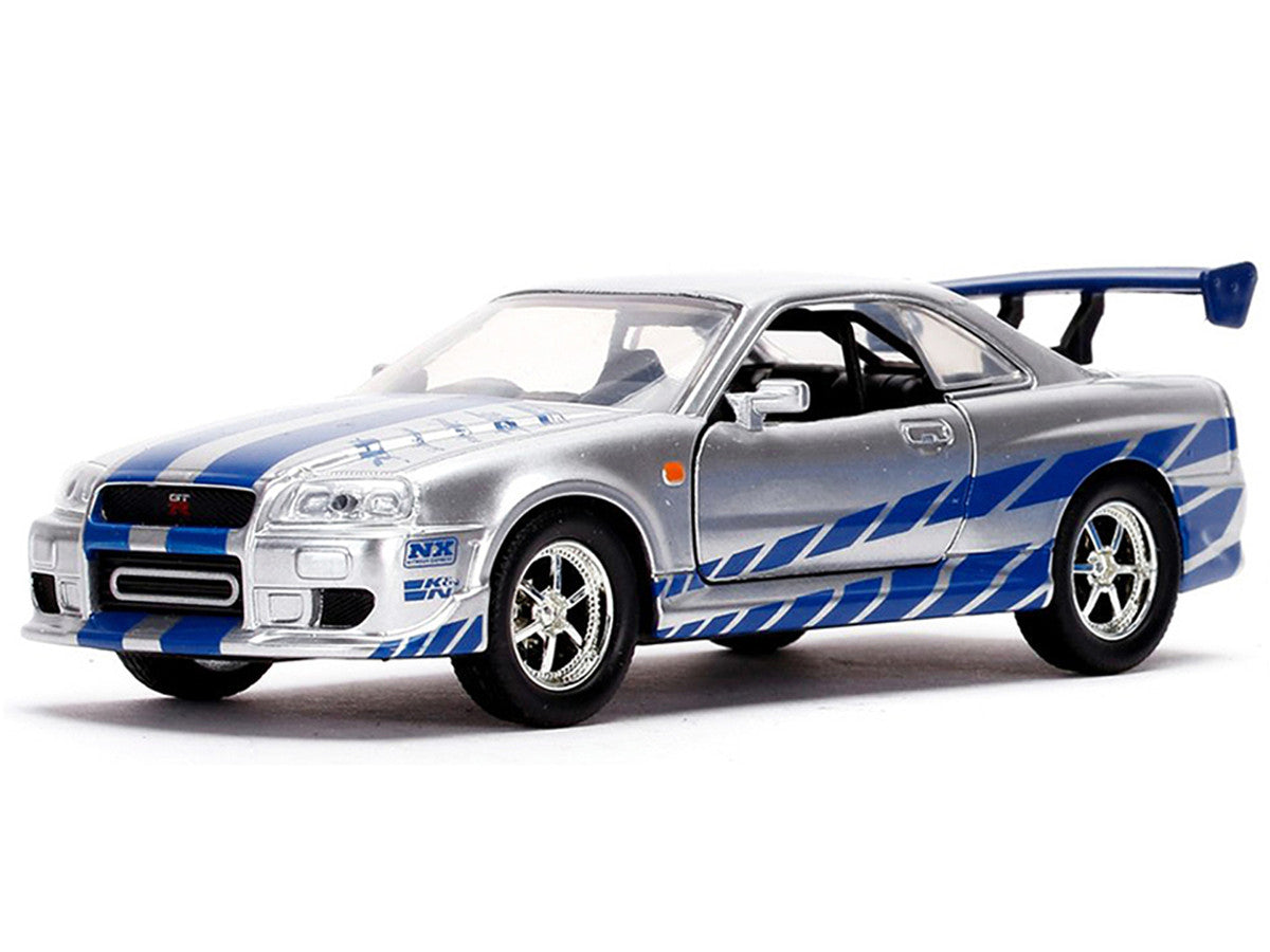 Brian's Nissan Skyline GT-R (BNR34) Silver with Blue Stripes and Nissan GT-R (BNR34) Blue Metallic Set of 2 pieces "25 Years of Fast & Furious" Series 1/32 Diecast Model Cars by Jada - image 3