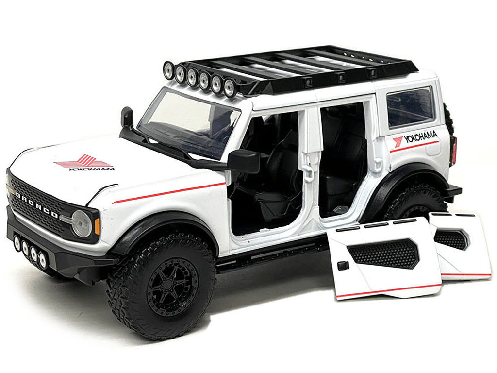 2021 Ford Bronco White with Red Stripes and Roof Rack "Yokohama Tires" "Just Trucks" Series 1/24 Diecast Model Car by Jada - image 2