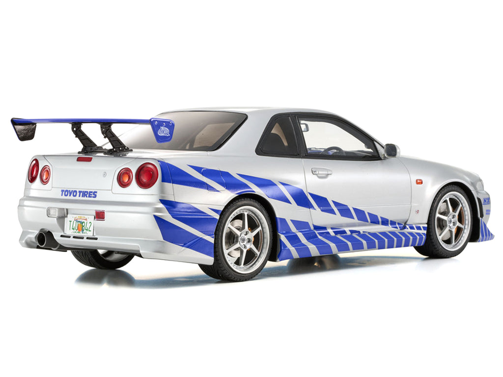 Nissan Skyline GT-R (R34) RHD (Right Hand Drive) Silver Metallic with Blue Graphics "2 Fast 2 Furious" (2003) Movie 1/12 Model Car by Kyosho - image 3