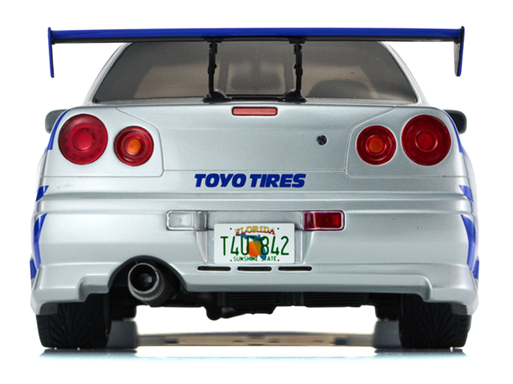 Nissan Skyline GT-R (R34) RHD (Right Hand Drive) Silver Metallic with Blue Graphics "2 Fast 2 Furious" (2003) Movie 1/12 Model Car by Kyosho - image 5
