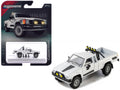 1985 Toyota Hilux SR5 Pickup Truck White with Black Graphics "Collection" Series 1/64 Diecast Model Car by Majorette