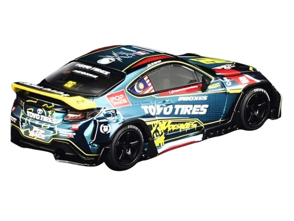 Toyota Pandem GR86 "Tengku Djan Ley" Blue Metallic with Graphics 1/64 Diecast Model Car by Pop Race