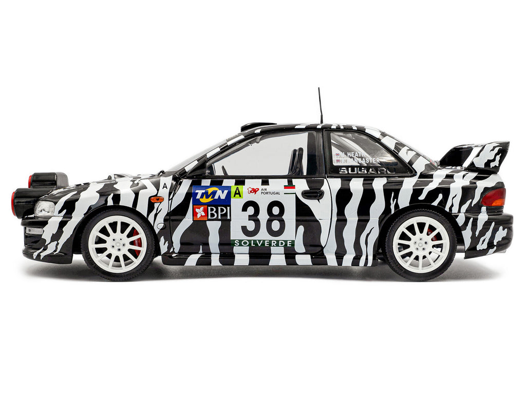 Subaru Impreza S5 WRC99 #38 Nigel Heath - Steve Lancaster "Rallye de Portugal" (2001) "Competition" Series 1/18 Diecast Model Car by Solido - image 3