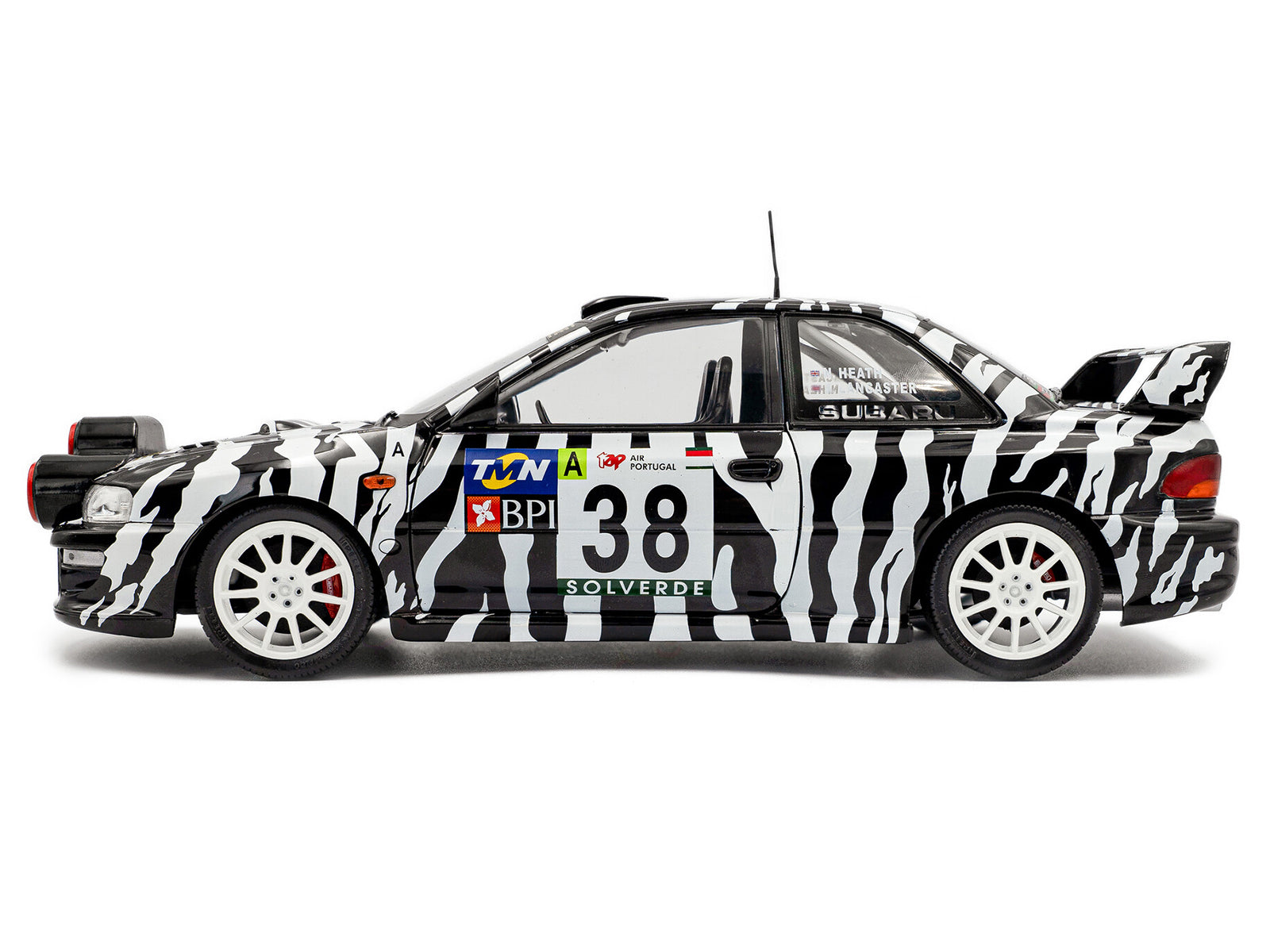 Subaru Impreza S5 WRC99 #38 Nigel Heath - Steve Lancaster "Rallye de Portugal" (2001) "Competition" Series 1/18 Diecast Model Car by Solido - image 3