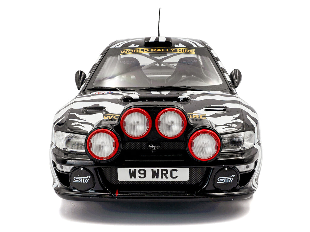 Subaru Impreza S5 WRC99 #38 Nigel Heath - Steve Lancaster "Rallye de Portugal" (2001) "Competition" Series 1/18 Diecast Model Car by Solido - image 5