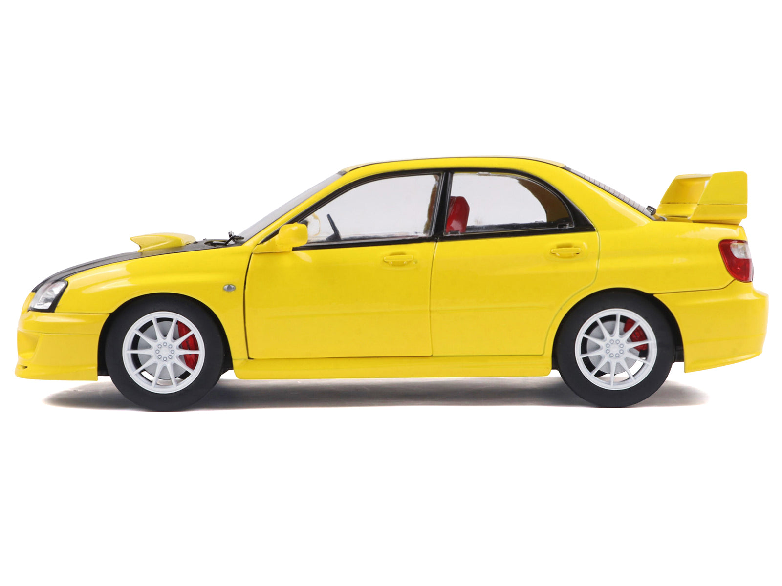2003 Subaru Impreza WRX STI RHD (Right Hand Drive) Yellow with Carbon Hood 1/18 Diecast Model Car by Solido - image 3