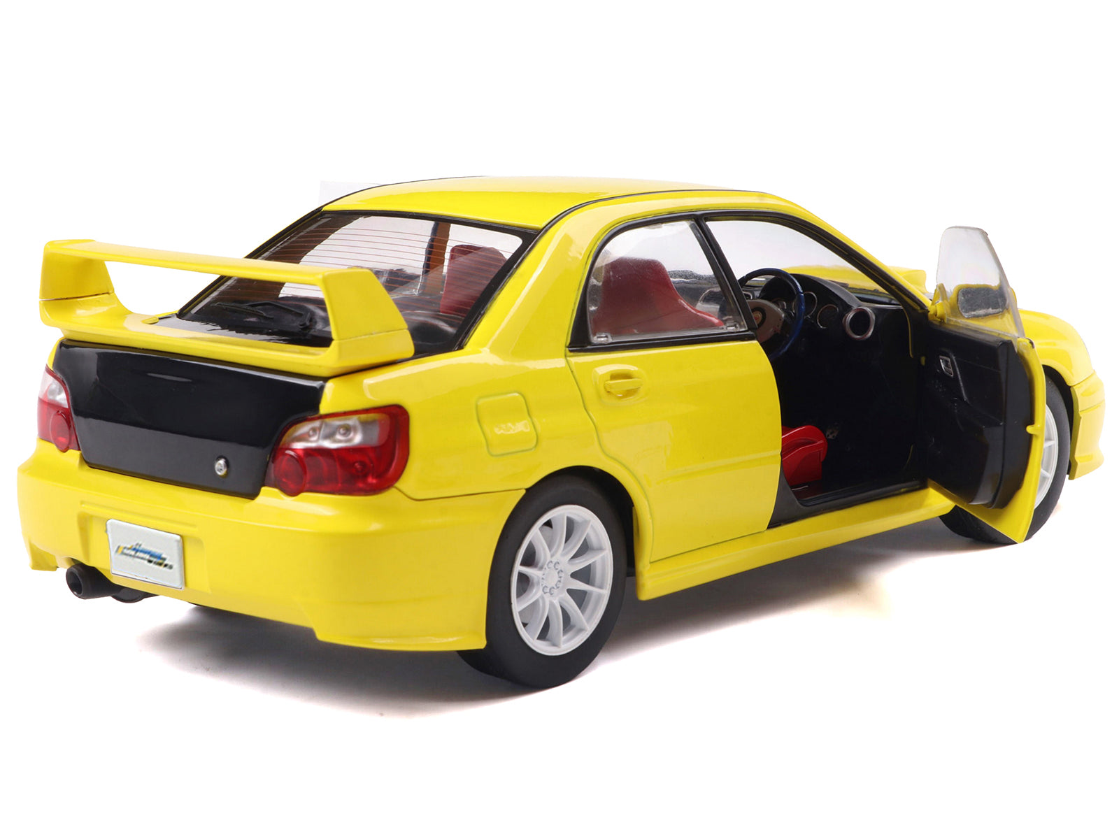 2003 Subaru Impreza WRX STI RHD (Right Hand Drive) Yellow with Carbon Hood 1/18 Diecast Model Car by Solido - image 4