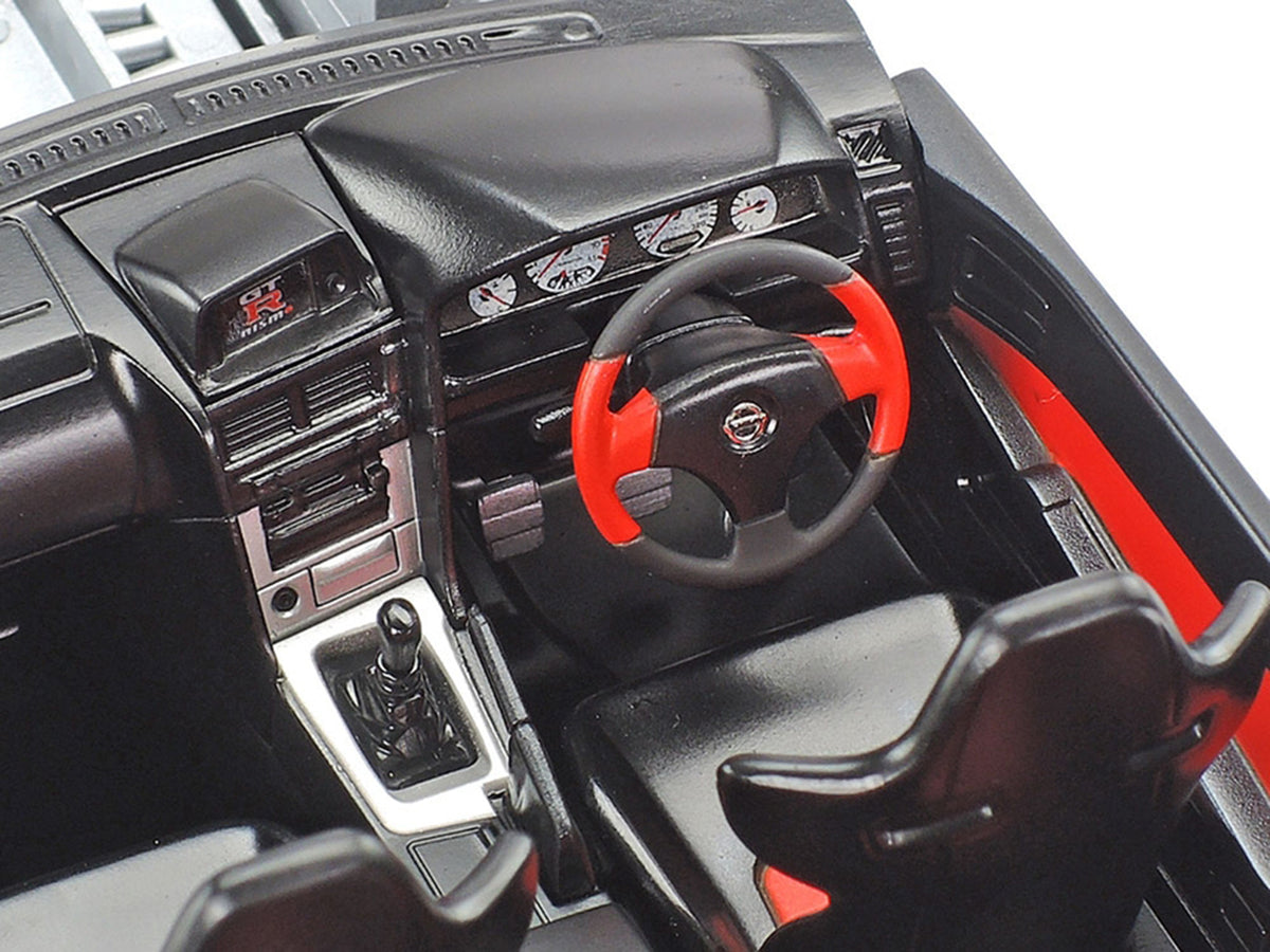 Model Kit Nissan Skyline GT-R (R34) Nismo Z-Tune 1/24 Scale Model by Tamiya - image 3