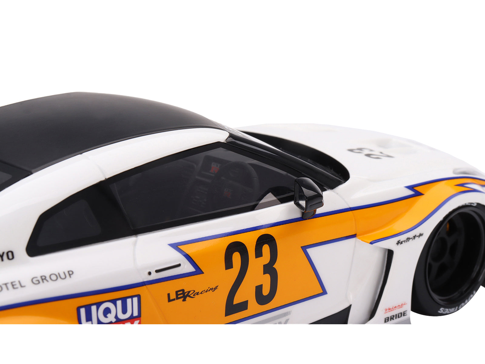 Nissan LB-Silhouette WORKS GT 35GT-RR Ver.1 RHD (Right Hand Drive) #23 White with Yellow Stripes "LB Racing" 1/18 Model Car by Top Speed - image 2