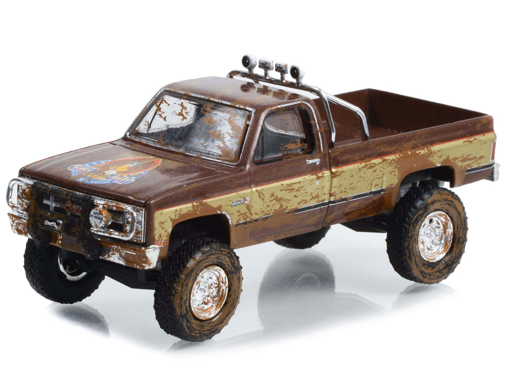 1982 GMC K-2500 Sierra Grande Pickup Truck Brown and Gold (Dirty Version) "Fall Guy Stuntman Association" Hollywood Special Edition 1/64 Diecast Model Car by Greenlight - image 2