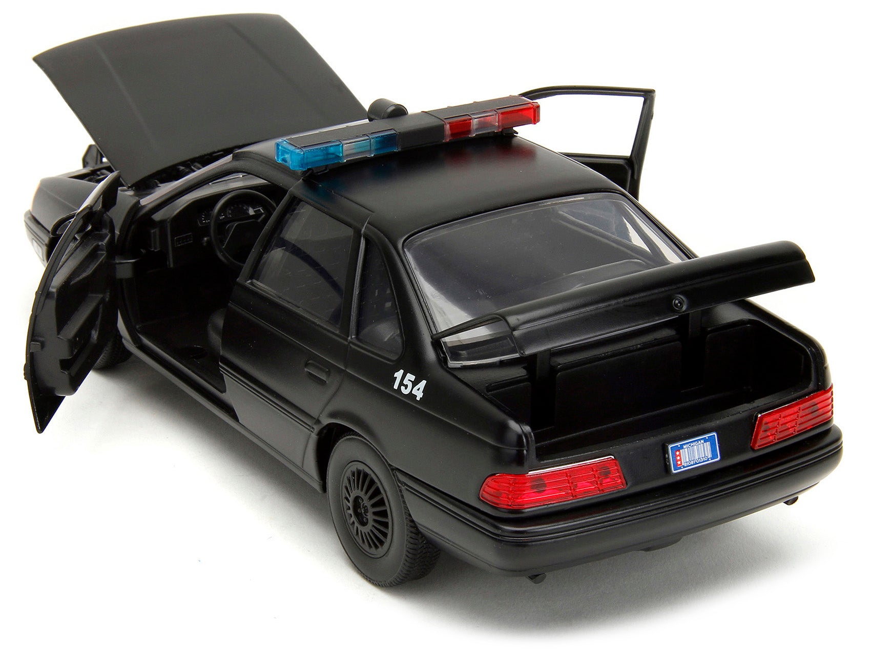 Ford Taurus OCP Matt Black "Detroit Police" and Robocop Diecast Figure 35th Anniversary "Robocop" (1987) Movie "Hollywood Rides" Series 1/24 Diecast Model Car by Jada - image 3