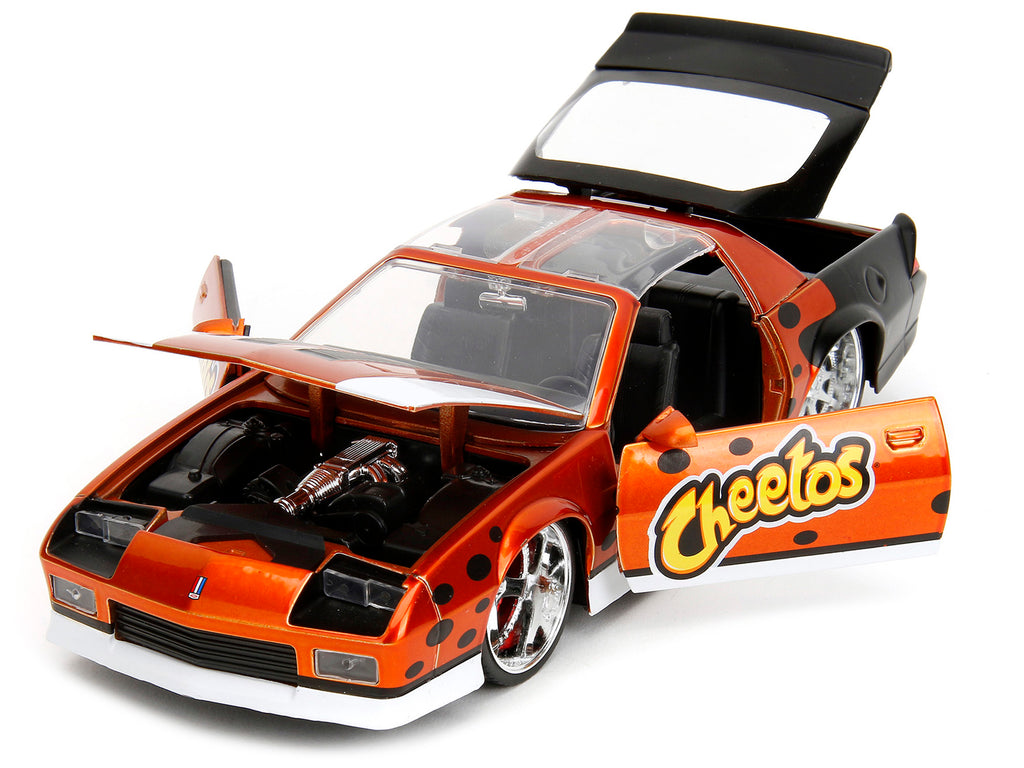 1985 Chevrolet Camaro Z/28 Orange Metallic with Graphics and Chester Cheetah Diecast Figure "Cheetos" "Hollywood Rides" Series 1/24 Diecast Model Car by Jada - image 2