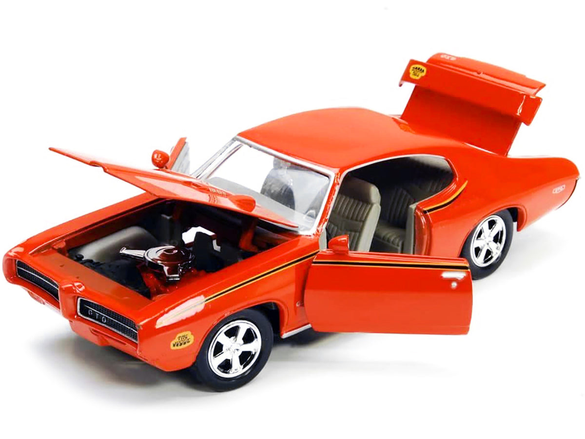 1969 Pontiac GTO Judge Orange with Stripes 1/24 Diecast Model Car by Motormax - image 2